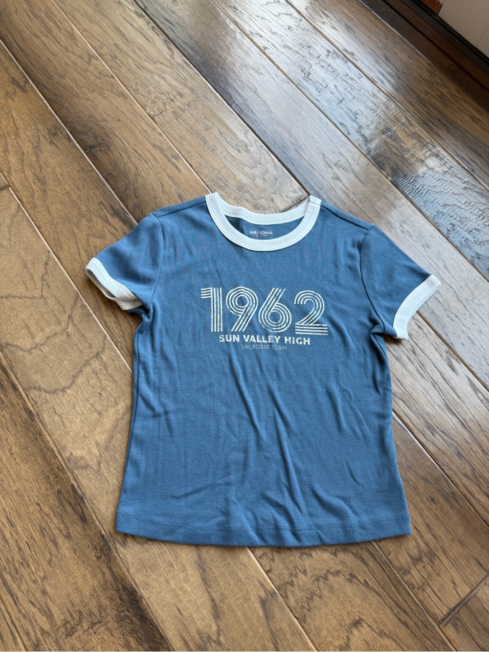 Arizona Jean Company Blue Tee with White Trim and 1962 Graphic